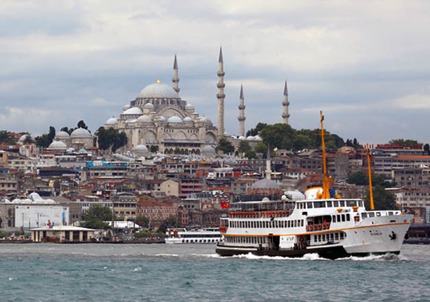 A passenger ferry, with the Suleymaniye Mosque in the background, sets sail in the Bosphorus in Istanbul, Turkey, on Tuesday (Reuters photo)